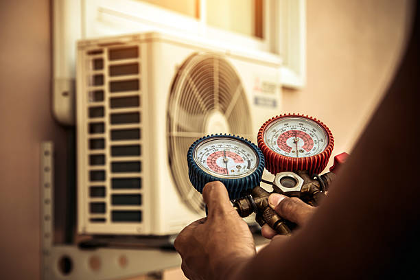Professional Air Conditioning Service technician working in Cecil, AL